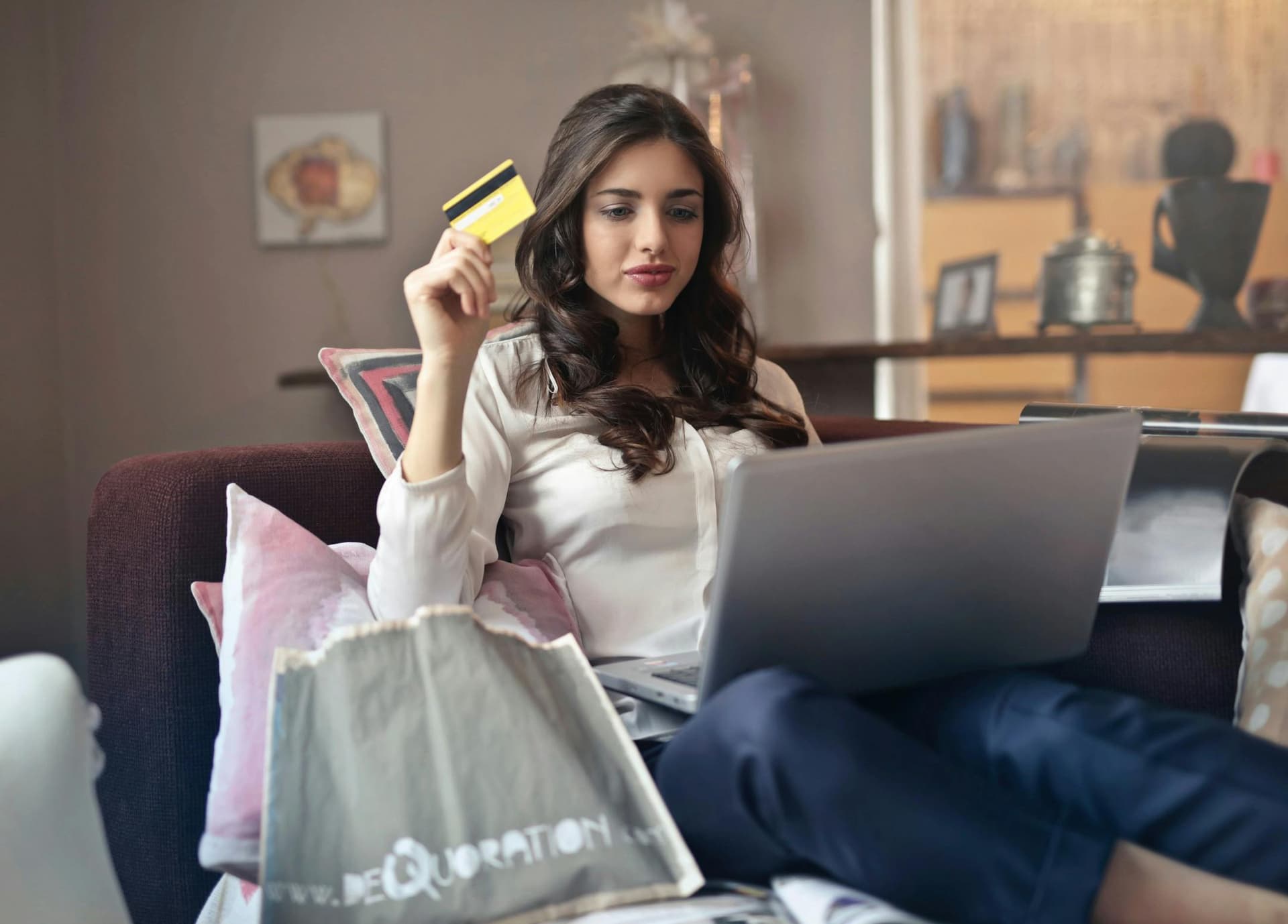 Woman shopping online with a rewards program
