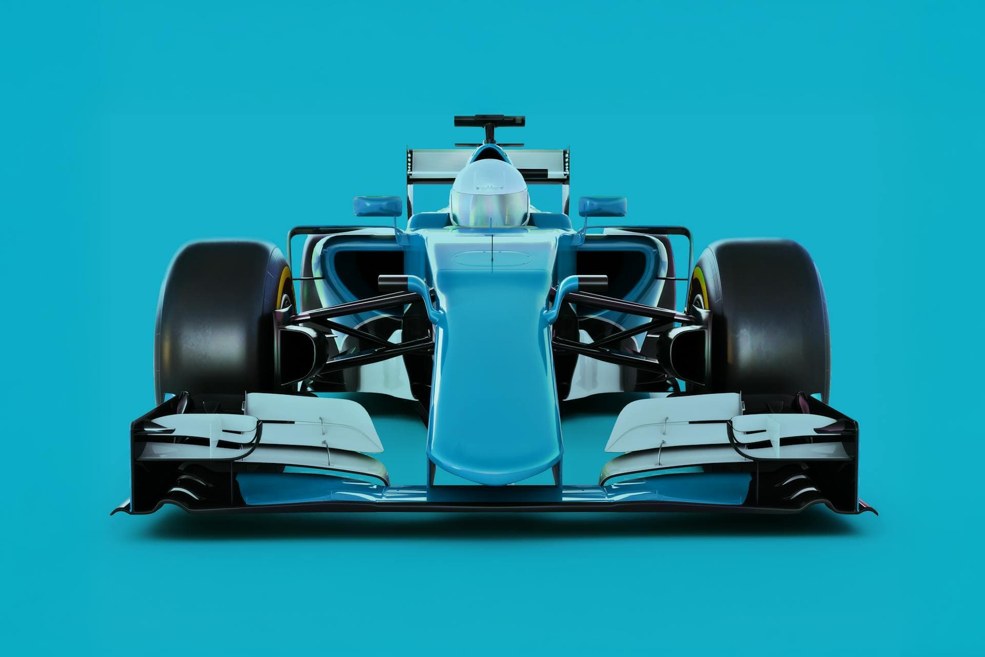 A head-on view of a blue race car against a blue background